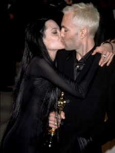 Angelina and James share a kiss.